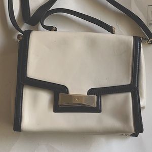This is a Kate Spade cross body bag. 10 inches across and 9 inches length.